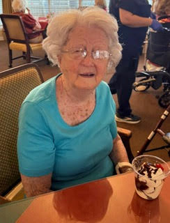 Evangela Hampton, the regional Administrator had a wonderful time at Maple Court Assisted Living offering ice cream sundaes for residents.